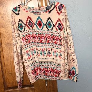 Women’s large slit arm top from local boutique.